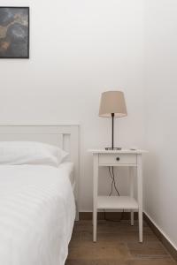 Postel nebo postele na pokoji v ubytování Apartments Ivan Zaton
