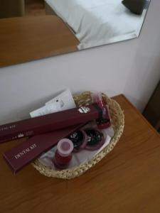 a basket filled with wine bottles on top of a table at Pridvorul Haiducilor in Slănic-Moldova +82 photos