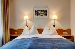 Postel nebo postele na pokoji v ubytování Hotel Meierhof
