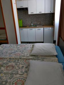 Postel nebo postele na pokoji v ubytování Villa Eleven