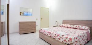 Posteľ alebo postele v izbe v ubytovaní Agriturismo Il Maremmano