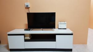a white desk with a tv on top of it at La Belle Cliff View in Ao Nang Beach