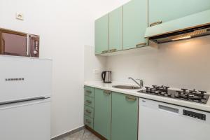 Küche/Küchenzeile in der Unterkunft Apartments Gea