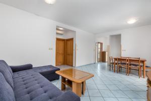 Ein Sitzbereich in der Unterkunft Apartments Gea