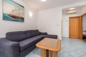 Ein Sitzbereich in der Unterkunft Apartments Gea