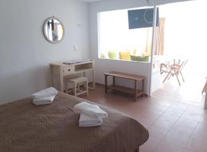 Posteľ alebo postele v izbe v ubytovaní Beach View Matala
