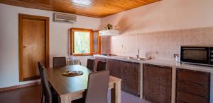 Kuchyňa alebo kuchynka v ubytovaní Agriturismo Il Maremmano