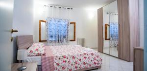 Posteľ alebo postele v izbe v ubytovaní Agriturismo Il Maremmano