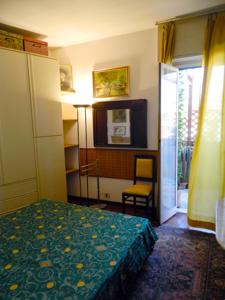 A bed or beds in a room at Abitazione Pigneto B&B