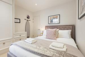Postel nebo postele na pokoji v ubytování Prime Apartments in Covent Garden