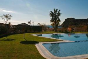 The swimming pool at or close to Playa Paraiso 27A