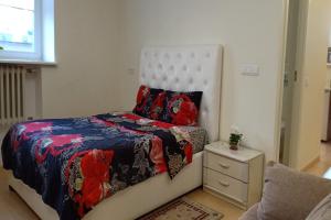 Кровать или кровати в номере Kaunas Downtown Apartments