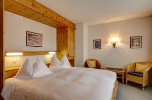 Postel nebo postele na pokoji v ubytování Hotel Meierhof