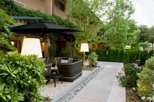 Κήπος έξω από το Hotel Ai Gelsi