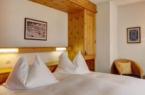 Postel nebo postele na pokoji v ubytování Hotel Meierhof