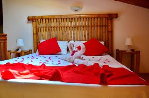 Tempat tidur dalam kamar di Porto Antigo Top 10