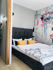 Łóżko lub łóżka w pokoju w obiekcie "Ku Słońcu" -Pokoje& Apartamenty - Jastrzębia Góra