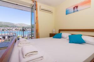 Katil atau katil-katil dalam bilik di Villa Jadran Trogir ćiovo +153 gambar