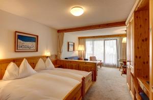 Säng eller sängar i ett rum på Hotel Meierhof