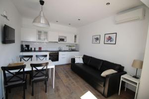 Kuchyň nebo kuchyňský kout v ubytování Apartments Ivan Zaton
