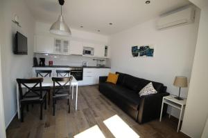 Kuchyň nebo kuchyňský kout v ubytování Apartments Ivan Zaton