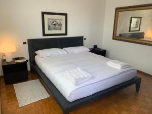 A bed or beds in a room at Rana B&B