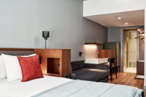 Tempat tidur dalam kamar di Hotel Achilleas