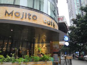 a mochica store on the side of a city street at Paco Hotel Gangding Metro Guangzhou-Free Shuttle Bus fir Canton Fair in Guangzhou