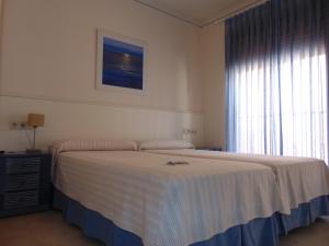 Postel nebo postele na pokoji v ubytování Colores de Zahara