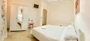Postel nebo postele na pokoji v ubytování B&B Scilla Mare