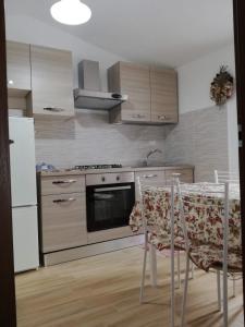 A kitchen or kitchenette at Alloggio Turistico Civico 4