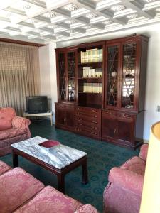 a living room with a couch and a coffee table at Casa Rural "Casa Maria" in Artana