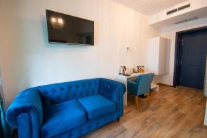 TV a/nebo společenská místnost v ubytování Center Luxury Rooms 1