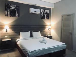 Cama o camas de una habitación en Hotel Bereg Evkaliptov