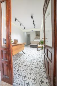 a hallway with a pool table in a room at 9Bodrum Hotel in Turgutreis