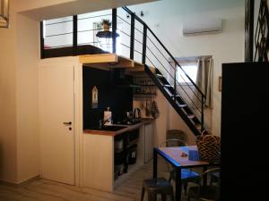 Kuchyň nebo kuchyňský kout v ubytování Amelia Apts & Rooms