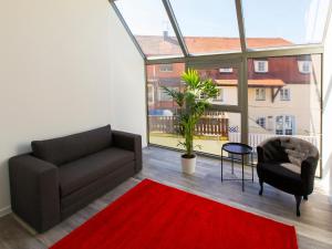 Posezení v ubytování DORMERO Hotel Roth