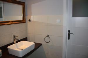 Ванна кімната в Apartament Sosnowy