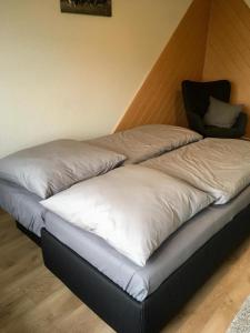 เตียงในห้องที่ Bauernhof Steffens