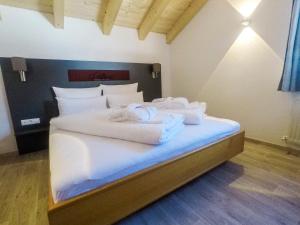 מיטה או מיטות בחדר ב-Collina Hotel Garni
