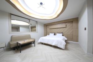 Postel nebo postele na pokoji v ubytování Eco Hotel