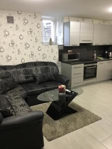 Area tempat duduk di Varkerulet Apartman