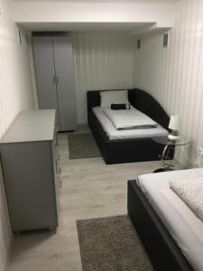 Letto o letti in una camera di Varkerulet Apartman