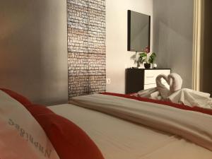 Postel nebo postele na pokoji v ubytování Niriides Rooms