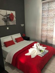 Postel nebo postele na pokoji v ubytování Niriides Rooms