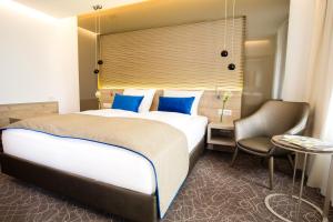 Postel nebo postele na pokoji v ubytování Hotel Atlas Leipzig