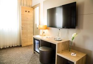 TV a/nebo společenská místnost v ubytování Hotel Atlas Leipzig