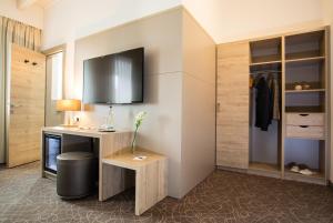 TV a/nebo společenská místnost v ubytování Hotel Atlas Leipzig