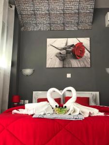 Postel nebo postele na pokoji v ubytování Niriides Rooms