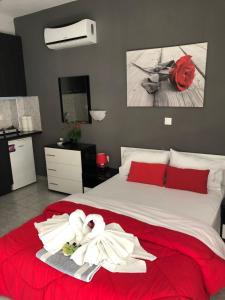 Postel nebo postele na pokoji v ubytování Niriides Rooms
